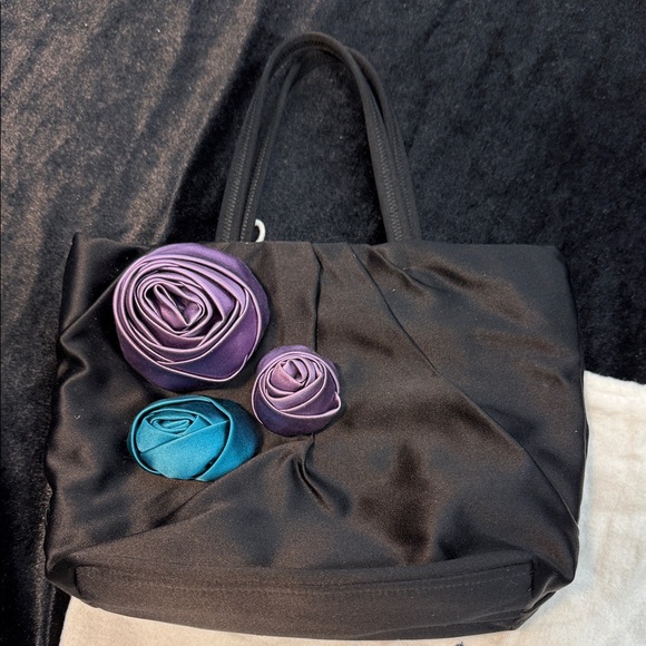 Prada Handbags - Prada Black Satin Mini Hand Bag with rosette appliqués.